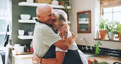 Buy stock photo Kitchen, hug and senior couple in home for love, bonding relationship and commitment together. Marriage, happy and elderly man and woman cooking together for wellness, meal prep and health in house