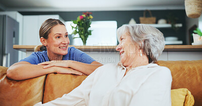 Buy stock photo Senior, woman and happy with caregiver for support in nursing home for assistance, gratitude and service. Elderly patient, nurse and smile on sofa for helping hand, conversation and help in hospice