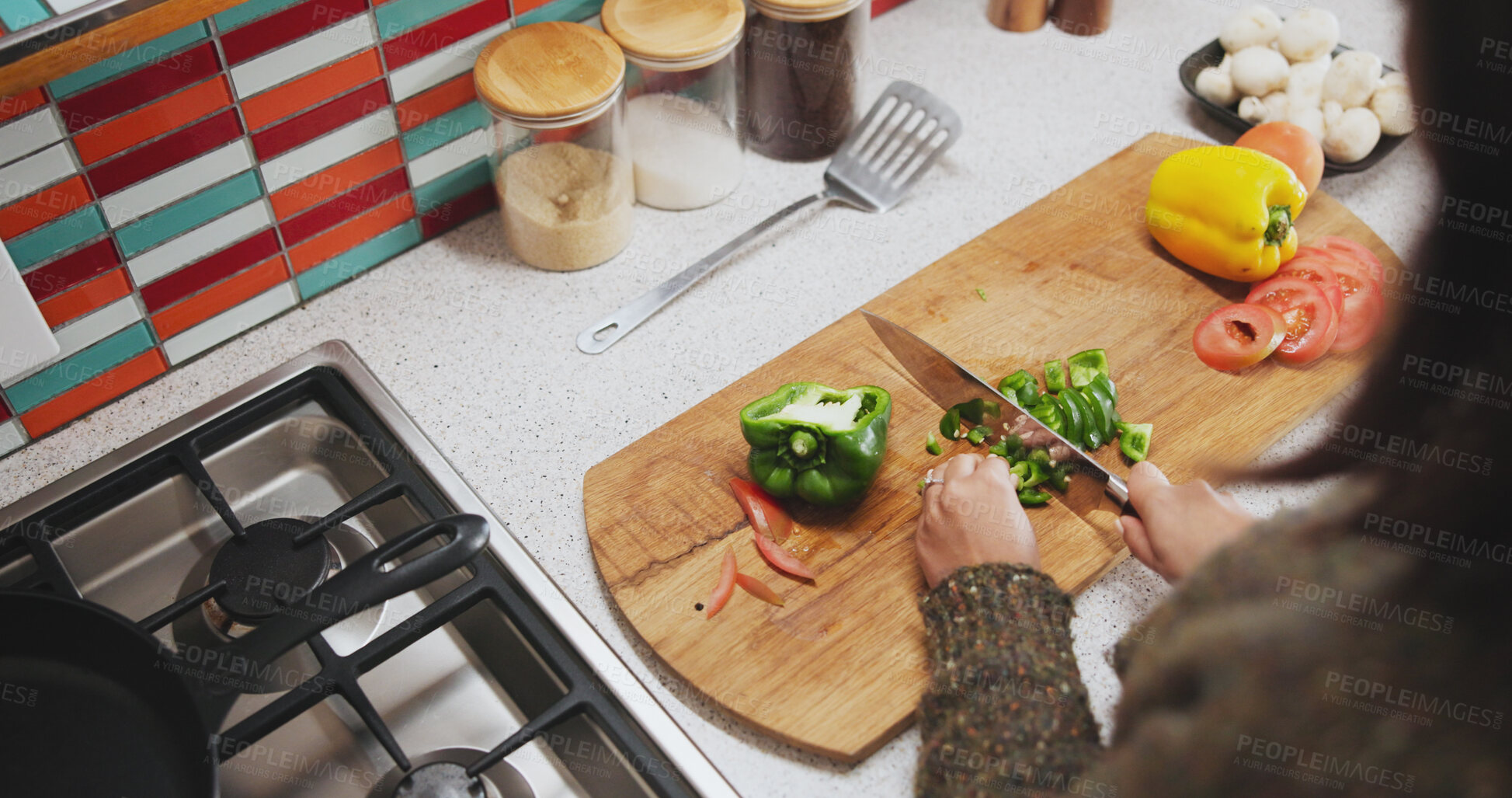 Buy stock photo Cooking, chopping and hands with vegetables, kitchen and knife on wooden board, food and breakfast. Morning, wellness and healthy for person, home and diet for vegan, countertop and meal prep