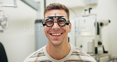 Buy stock photo Portrait, happy man and trial frame for eye care, vision and healthcare in clinic. Face, smile and patient with test lens or tool for wellness, ophthalmology or optometry for eyesight correction exam