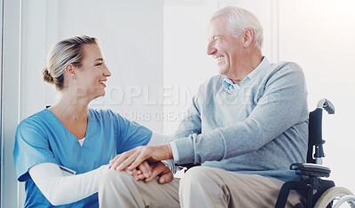 Buy stock photo Caregiver, smile and senior patient in hospital, holding hands and compassion for old man with disability. Clinic, nurse and elderly person on wheelchair, care and support for healthcare and wellness