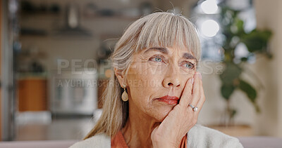 Buy stock photo Senior woman, thinking and mental health in lounge, hand and memory of past, retirement and depression in nursing home. Grandma, lonely and couch of house, widow and elderly person with grief and sad