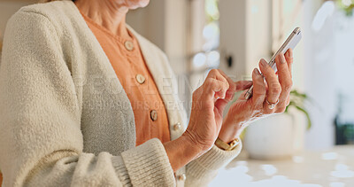 Buy stock photo Home, hand and senior woman with phone for network, communication and scroll on technology. House, internet and elderly person with smartphone for digital media, information and online news website