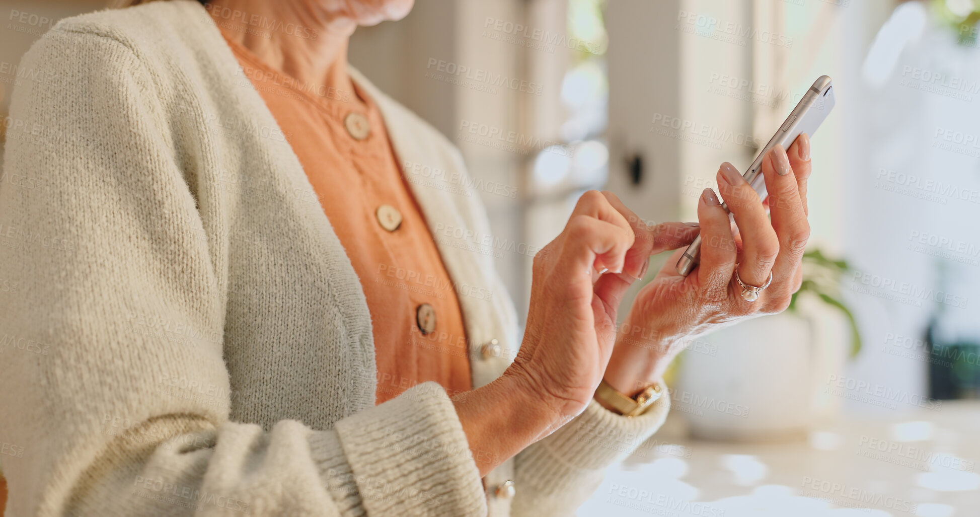 Buy stock photo Home, hand and senior woman with phone for network, communication and scroll on technology. House, internet and elderly person with smartphone for digital media, information and online news website