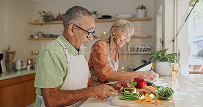 Buy stock photo Kitchen, vegetables and elderly couple with cooking for healthy dinner, nutrition or bonding. Retirement, senior man and woman with ingredients at home for meal prep, support or happiness in marriage