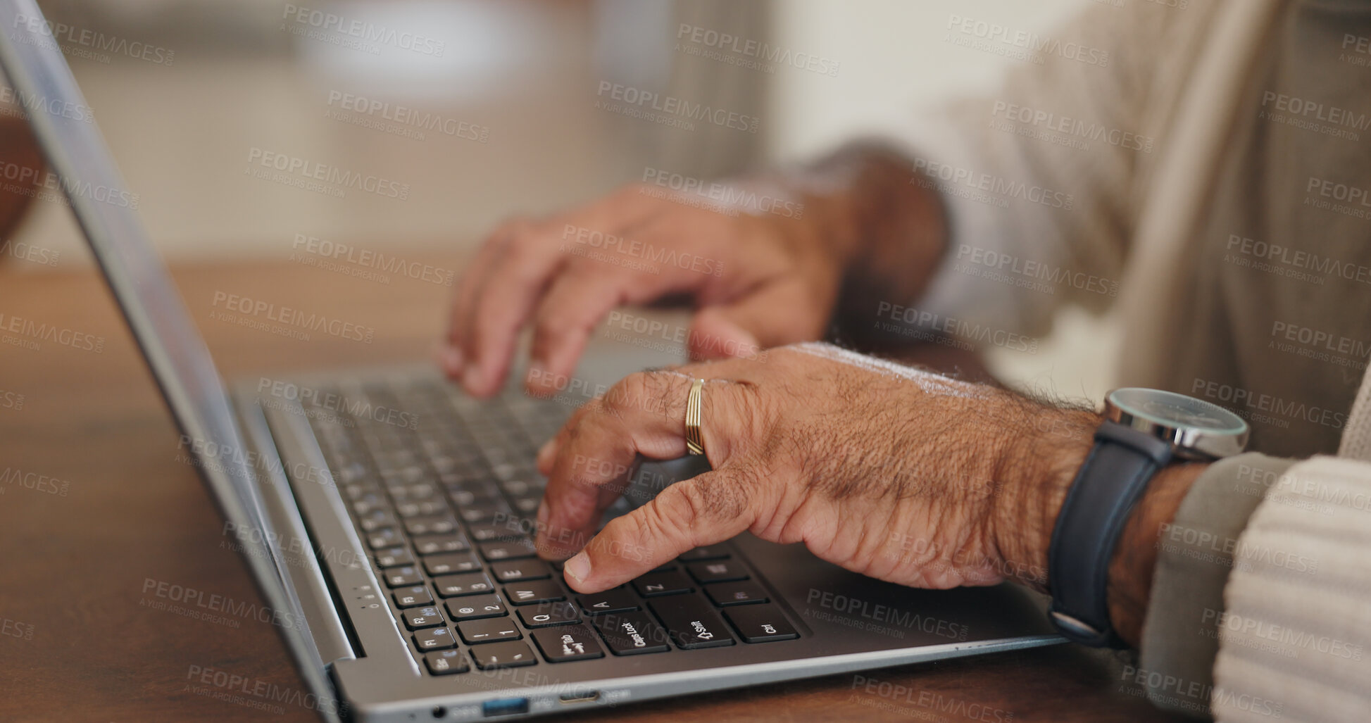 Buy stock photo Senior hands, laptop and typing at table, working or download on Internet for retirement budget. Person, fingers and computer at desk for online research, email plan for financial wellness at home