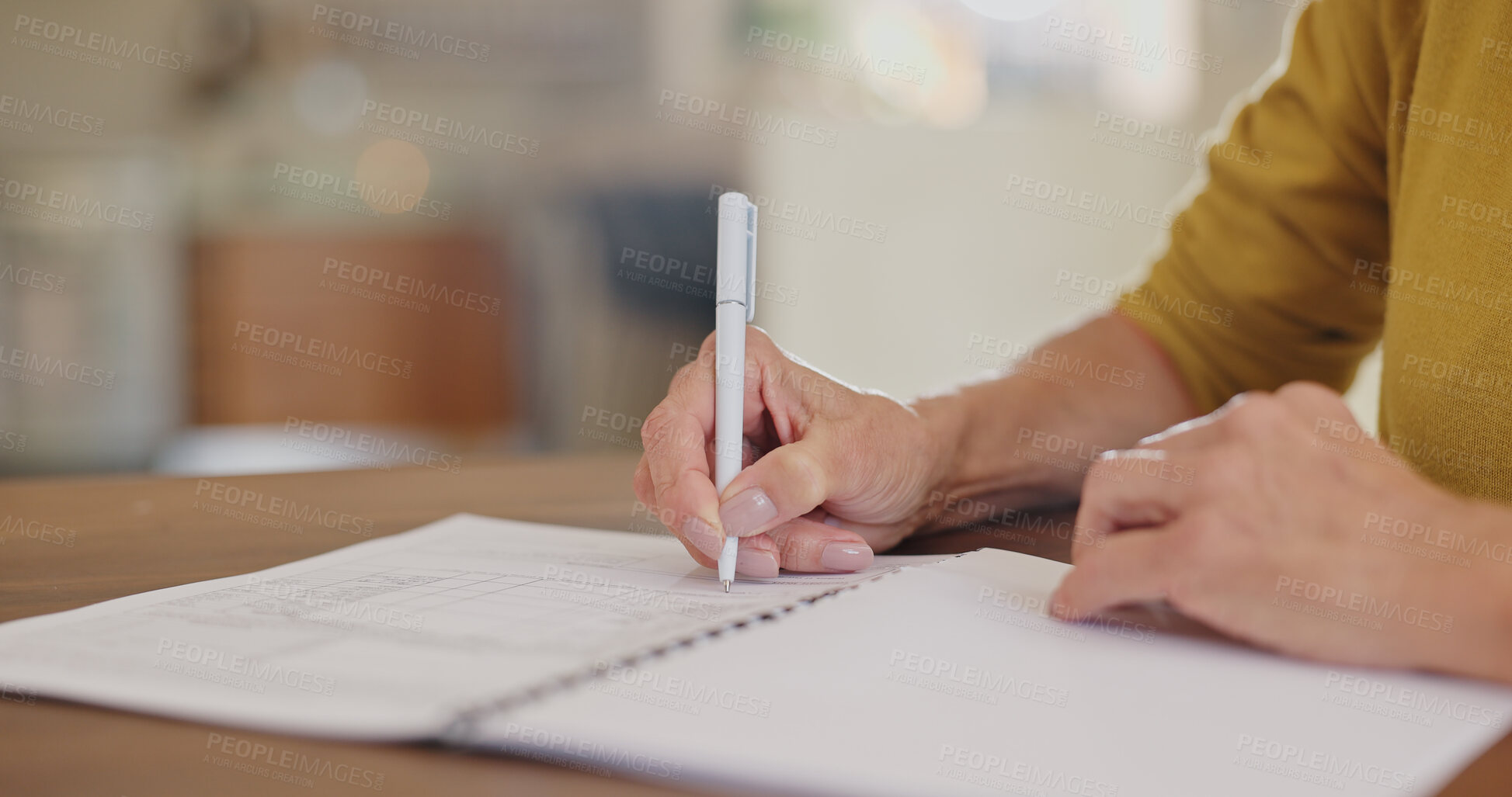 Buy stock photo Senior woman, hands and writing on paperwork, form or application for retirement plan or insurance at home. Closeup of elderly female person signing documents, document or agreement on table at house