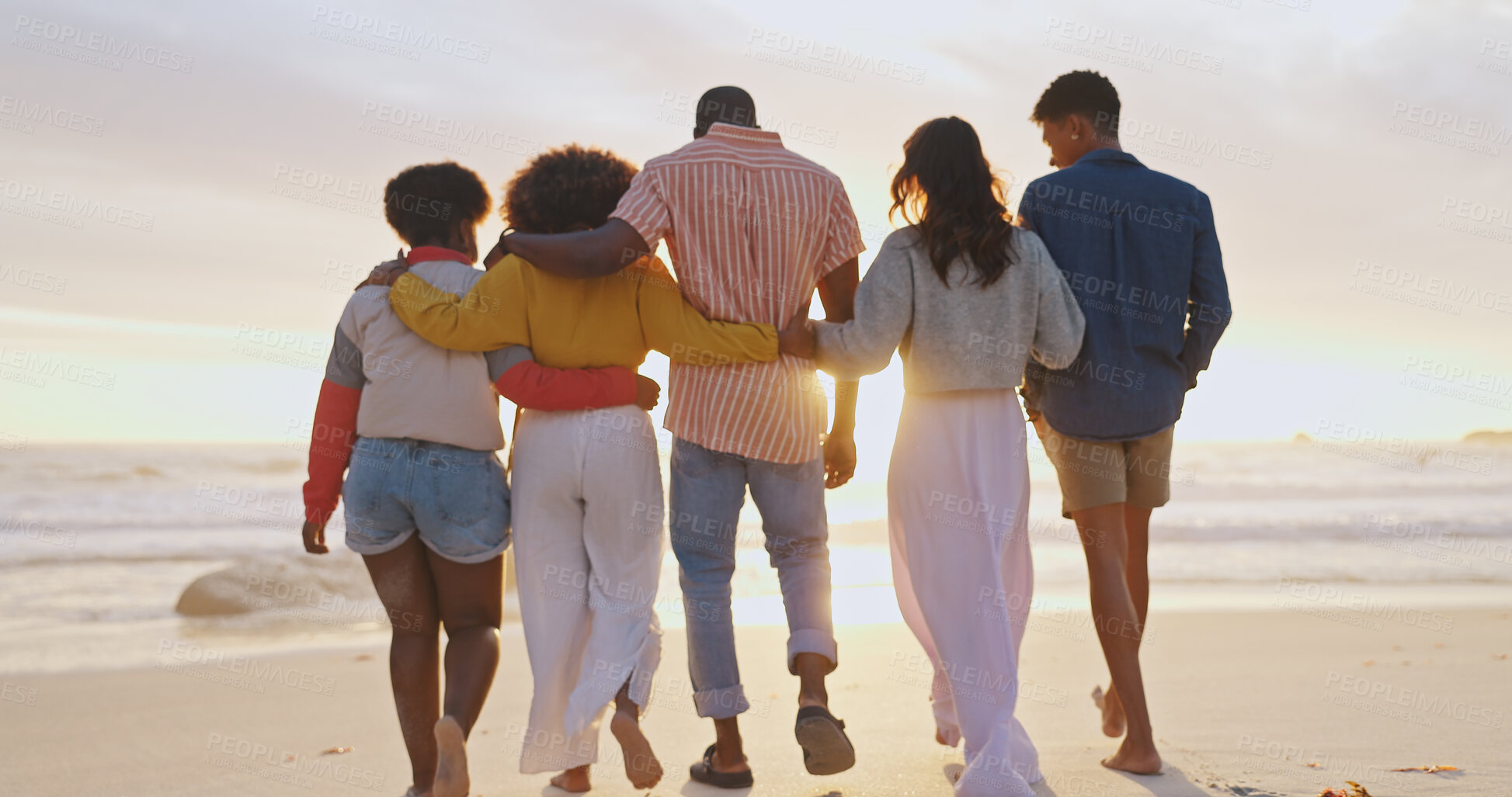 Buy stock photo Beach, back and friends hug at sunset on vacation, holiday and travel on tropical island. Embrace, men and group of women at sea outdoor for journey, relax or bonding at ocean on summer trip together