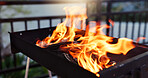Bbq, flame and grill in backyard for party, holiday or weekend lunch with fire or heat at home or patio. Outdoor barbecue for meat, steak or cooking on fire with tradition for USA independence day