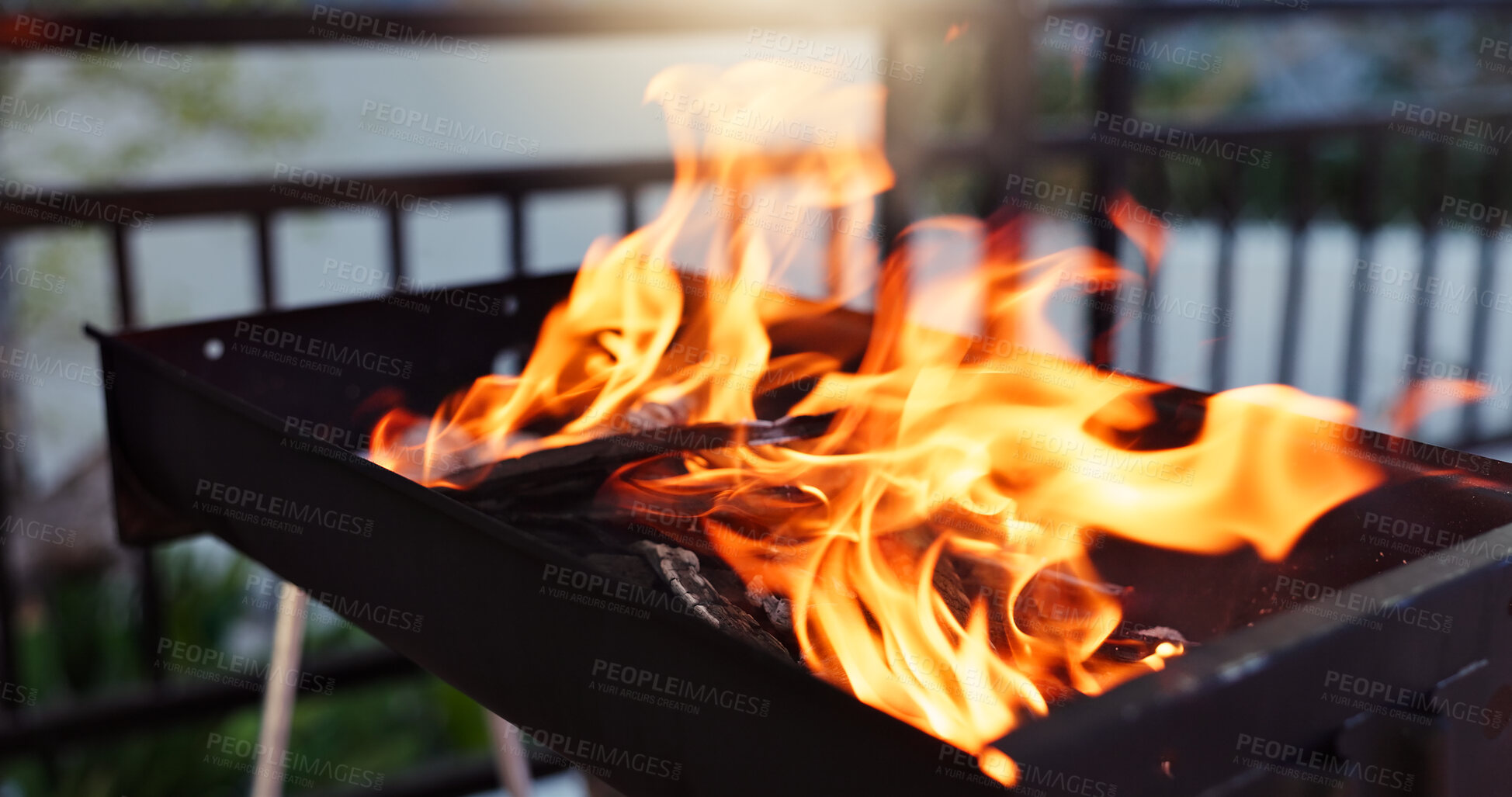 Buy stock photo Bbq, flame and grill with fire in backyard for party, holiday or weekend lunch with heat at home or patio. Outdoor barbecue for meat, steak or cooking with hot metal stand on porch to prepare meal