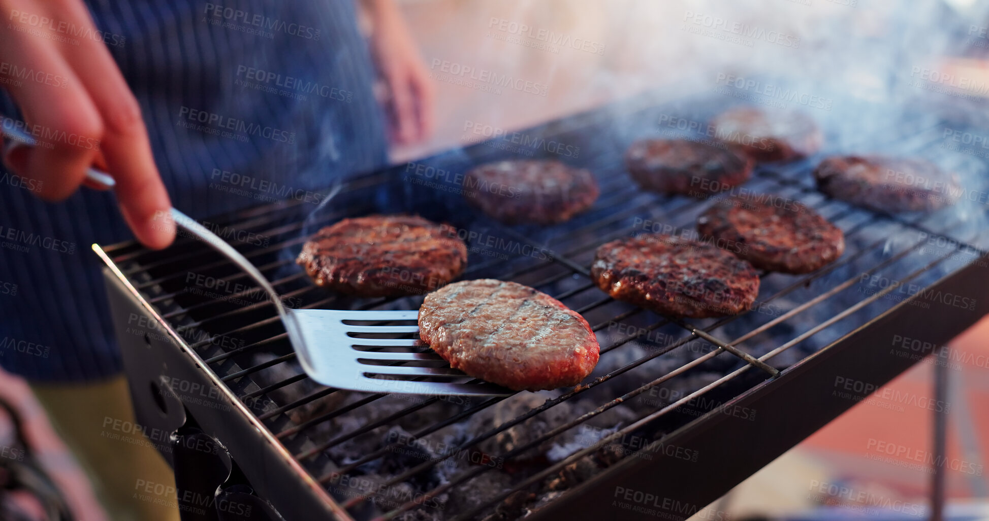 Buy stock photo Barbecue, reunion and person with burgers outdoor backyard for meal at party, social event or lunch on terrace. Grill, food and chef cooking patty, beef or meat for bbq dish on weekend at home.