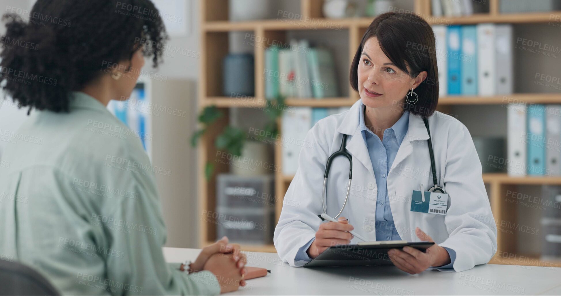 Buy stock photo Hospital, notes and report for doctor with patient for consulting, medical service and feedback in clinic. Healthcare, conversation and people with clipboard for diagnosis, results and insurance form