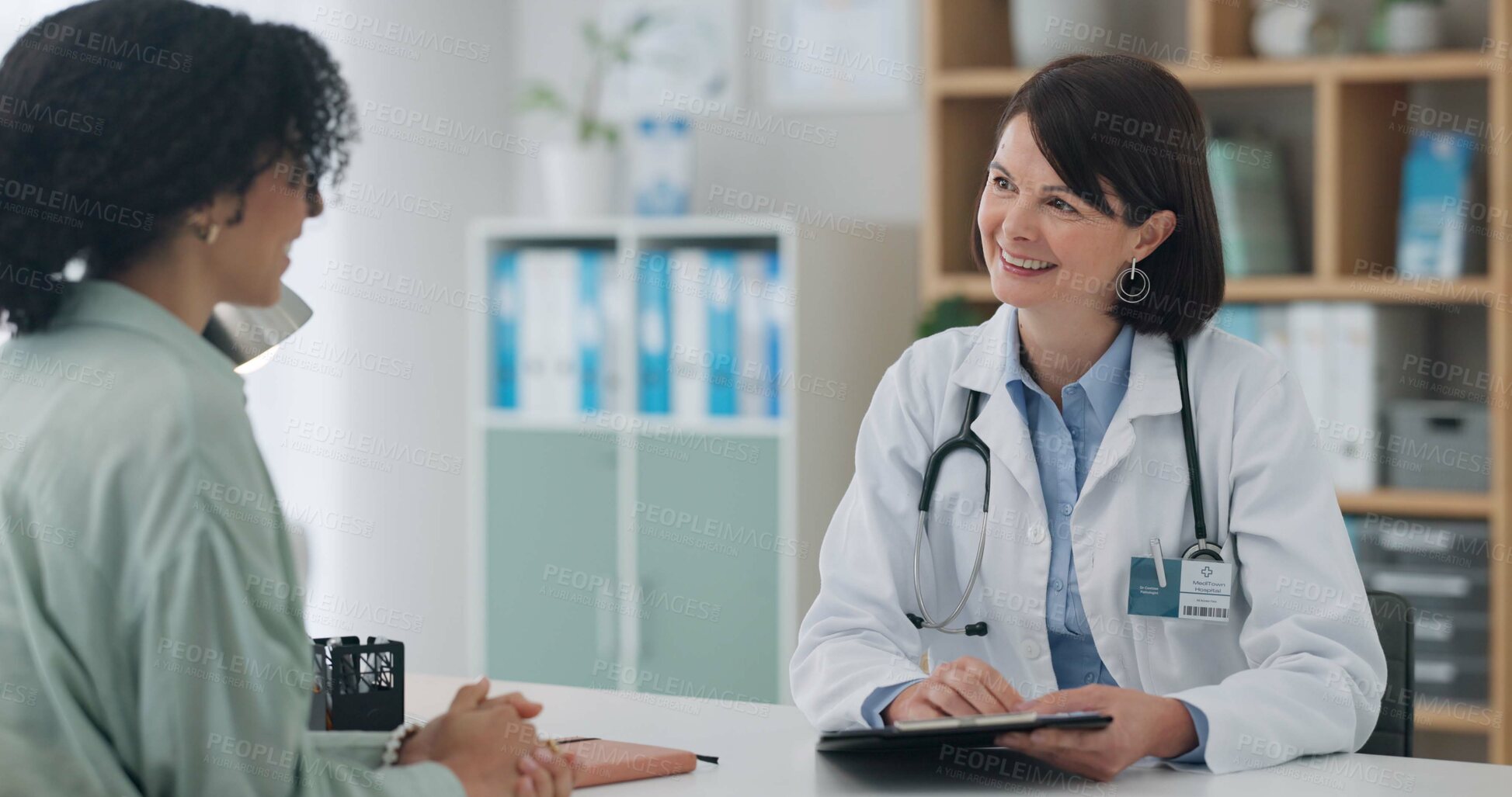 Buy stock photo Hospital, tablet and happy doctor with patient for consulting, medical service and help in clinic. Healthcare, telehealth and people on digital tech for diagnosis, online results and insurance