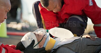 Buy stock photo Paramedic, oxygen and outdoor with patient, helping and rescue of breathing, service or ambulance for person. EMS, accident or injury on street, healthcare and medical professional with victim in USA