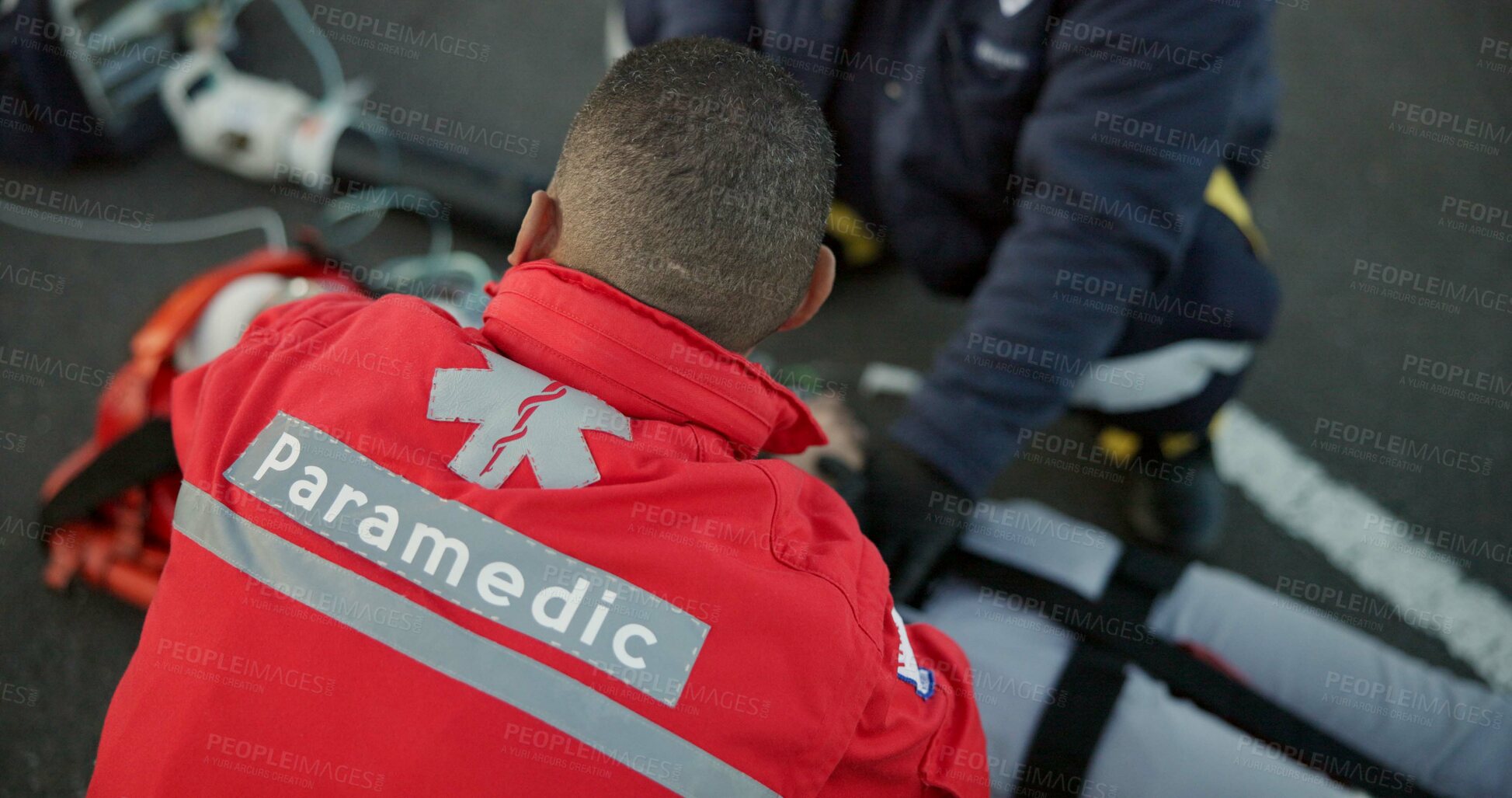 Buy stock photo People, uniform and paramedics with emergency, healthcare and patient with injury, victim and service. Staff, employees and medical with professional, save life and teamwork with equipment or outdoor