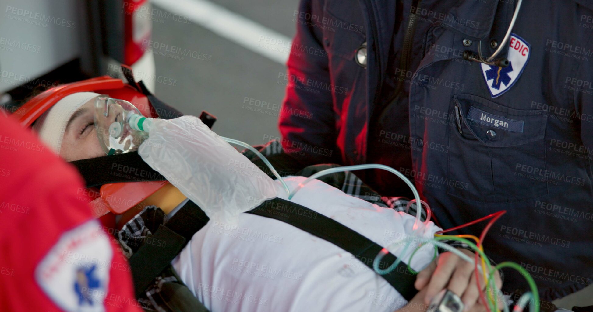 Buy stock photo People, paramedic and help patient in outdoor on scene for emergency, rescue and support. Emt team, healthcare and oral oxygen for injured person on accident for medical service, care and first aid