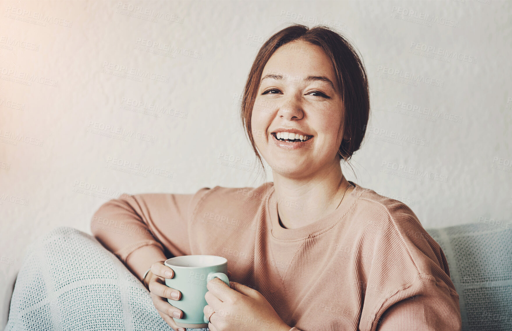 Buy stock photo Woman, portrait and cup of tea in home, peace and relax in living room with hot beverage. Female person, rest and happy with espresso drink on couch, weekend calm and smile for comfort in apartment