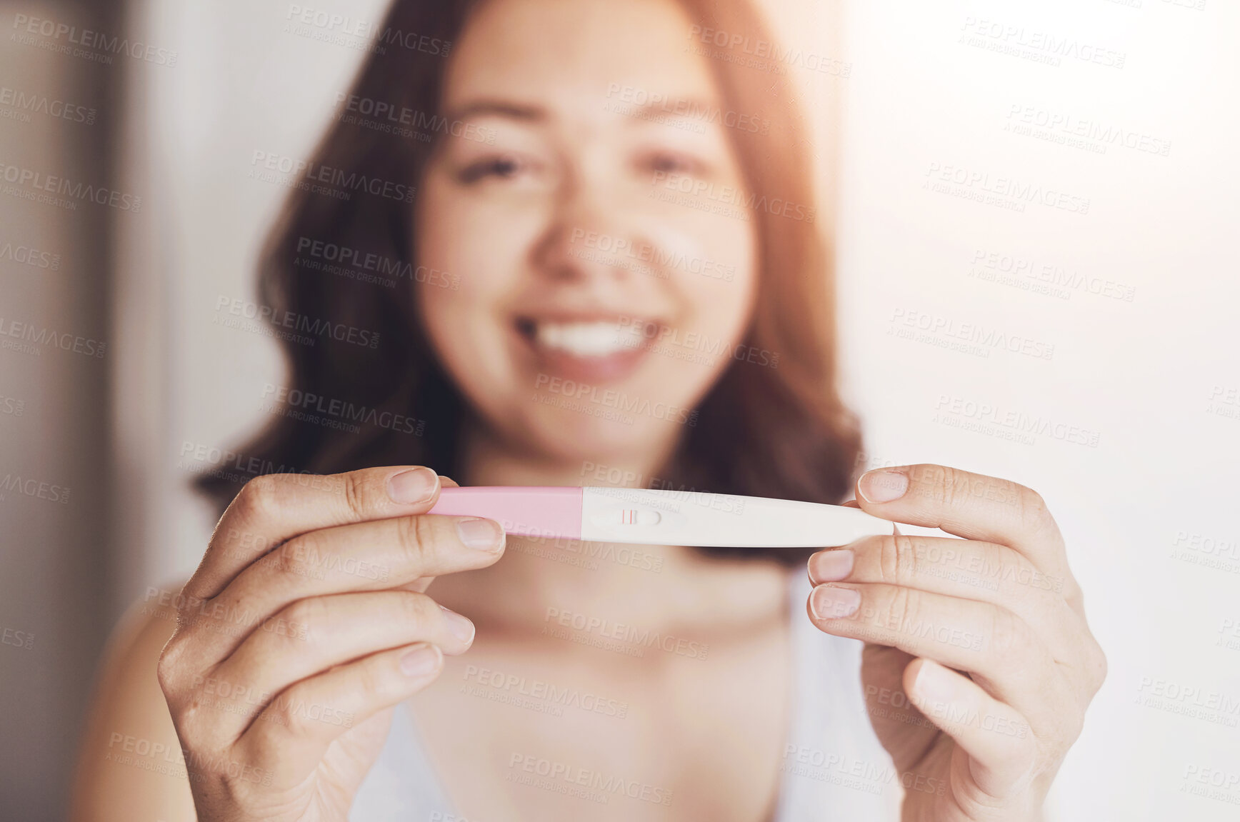 Buy stock photo Pregnancy test, happy and hands of woman in home excited for motherhood, parenting and baby. Health, maternity and portrait of person with medical kit for ivf treatment, fertility success or surprise