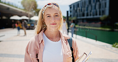 Buy stock photo Woman, portrait and outdoor smile at university, books for education or learning on campus. Female student, happiness and notes for knowledge at college, academy scholarship for school in Canada