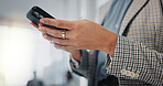 Office, hands and businessperson with smartphone for typing, chat and using phone for text message. Workplace, employee and mobile application for social media, networking and online communication