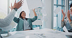 Success, paper in air and business people in meeting with company win, celebration and cheers in office. Documents, success and achievement with team building, happy employees and bonus from results