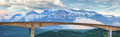 Buy stock photo Clouds, bridge or landscape of mountains with natural environment or countryside in Norway. Horizon, calm peace or scenic view of Europe in remote area for outdoor travel, holiday and vacation break