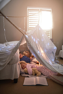 Buy stock photo Home, bedroom and children with sleeping in tent for rest, dreaming and indoor adventure together. Boy, girl and relax with kids in blanket fort at house for fun sleepover, tired and development