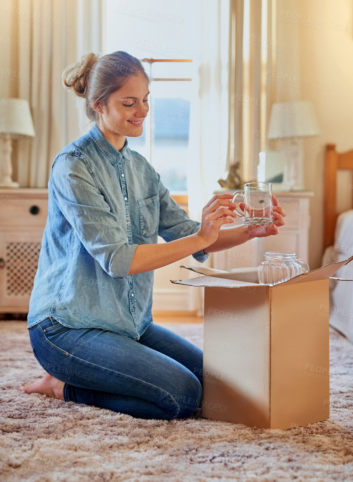 Buy stock photo Cardboard box, woman and new home owner unpacking for mortgage, real estate investment or moving. Bedroom, smile female person with package for happiness, property rent or relocating in apartment