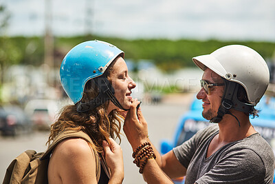 Buy stock photo Helmet, helping and couple safety on road trip for adventure, travel and enjoying weekend. Love, happiness and man with woman, support and ride on motorcycle for holiday, vacation and journey