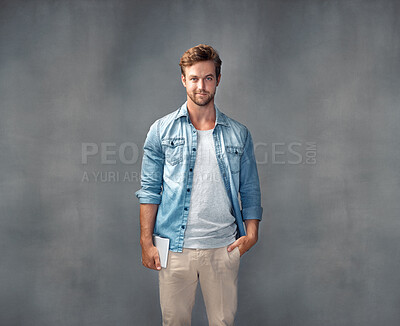 Buy stock photo Studio, portrait and student with tablet, proud and internet to study, poster and online for education in app. Gray background, smile and person with tech, face and connection for man in mockup