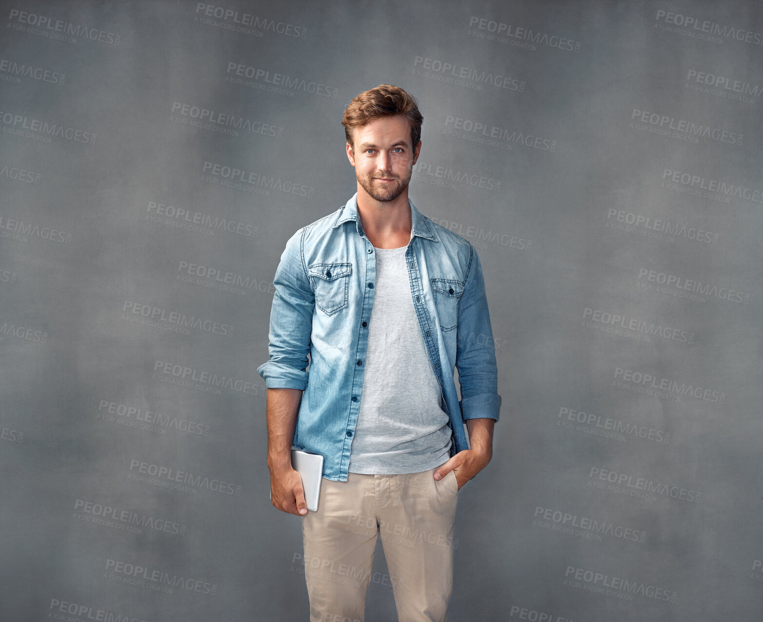 Buy stock photo Studio, portrait and student with tablet, proud and internet to study, poster and online for education in app. Gray background, smile and person with tech, face and connection for man in mockup