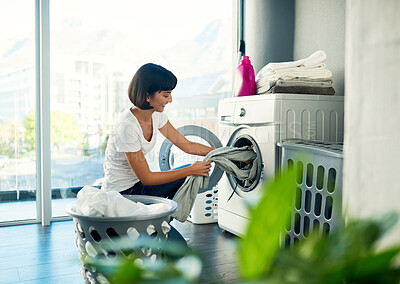 Buy stock photo Washing machine, laundry and happy woman cleaning fabric in home for hygiene or housekeeping. Chores, dryer and person take clothes in electrical appliance for housework or fresh textile in basket