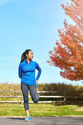 Buy stock photo Asian woman, legs and stretching with earphones for music, workout or outdoor training in countryside. Female person, athlete or runner in warm up, preperation or getting ready for cardio exercise