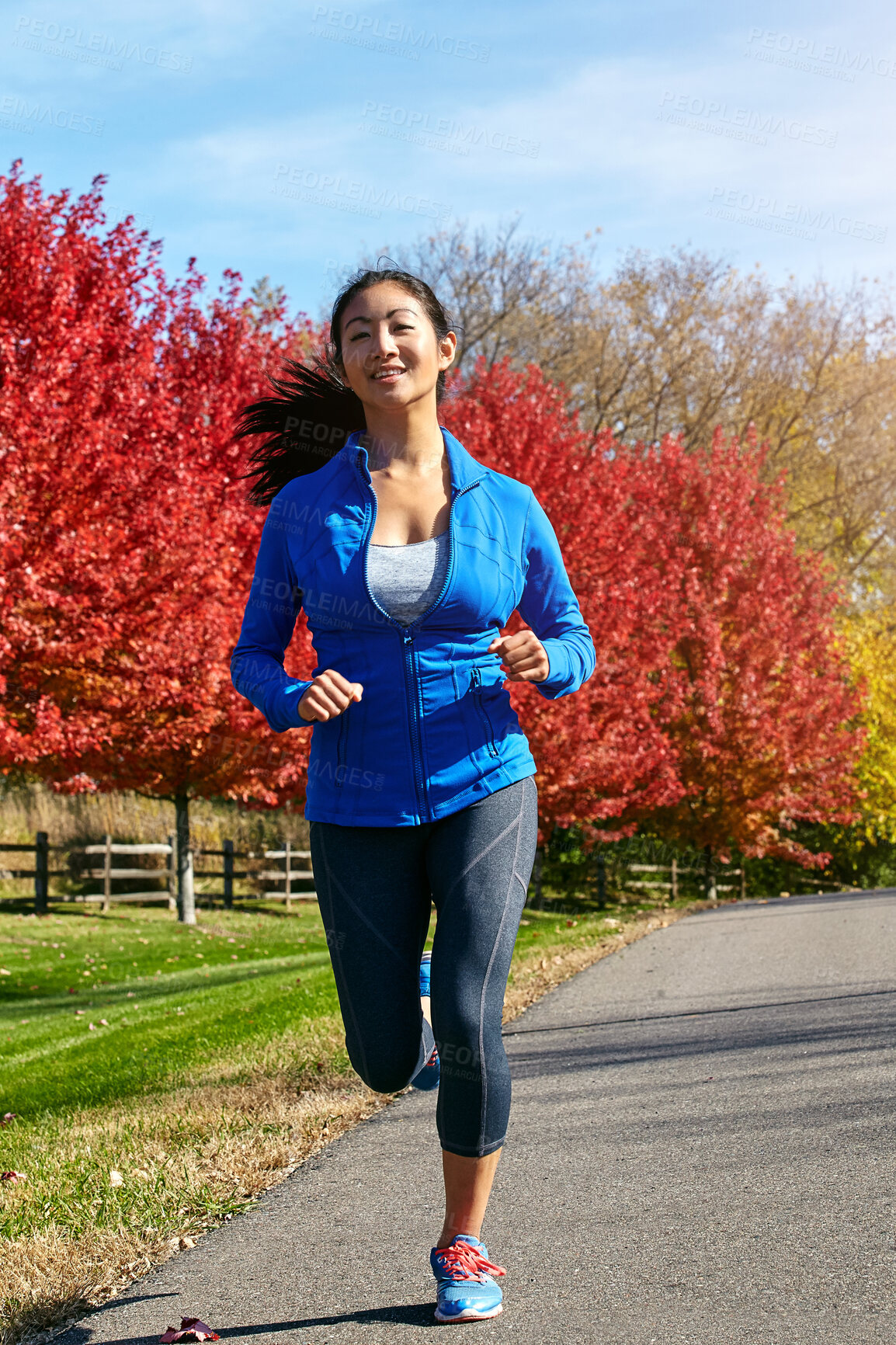 Buy stock photo Asian woman, running and wellness with cardio, exercise and challenge with endurance, nature and hobby. Healthy person, outdoor and runner with fitness, breathing and training with workout and smile