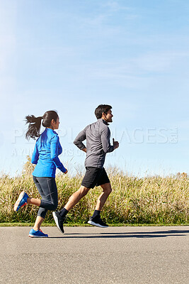 Buy stock photo Couple, running and energy with exercise, training and cardio with fitness, wellness and bonding together. Healthy people, outdoor and man with woman, runner or speed with challenge, hobby or support