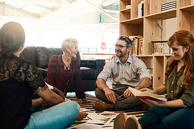 Buy stock photo Group, circle or business people sitting on floor for collaboration, documents and notes for ideas. Teamwork, huddle or meeting with manager for company plan, discussion for strategy in office