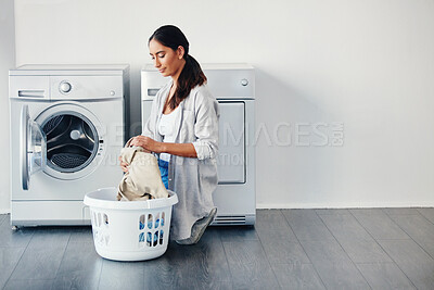 Buy stock photo Woman, laundry or clothes in washing machine in house for housekeeping, dirty linen or hygiene with basket. Spring cleaning, person or loading fabric in electrical appliance for housework in washroom