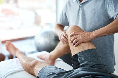 Buy stock photo Healthcare, knee and physiotherapist with man patient in clinic for healing, rehabilitation or treatment. Physical therapy, stretch and medical worker with athlete for leg injury or accident recovery