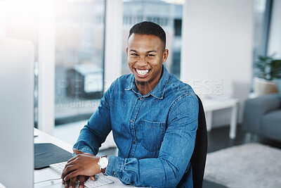 Buy stock photo Portrait, smile and black man by computer in office, workspace and desk happy in creative career. Happiness, internship and journalist with technology for typing, research and internet for working