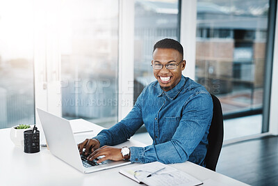 Buy stock photo Working, typing and portrait of black man by laptop in office, workspace and desk happy in creative career. Communication, internship and journalist with tech for contact, research and internet