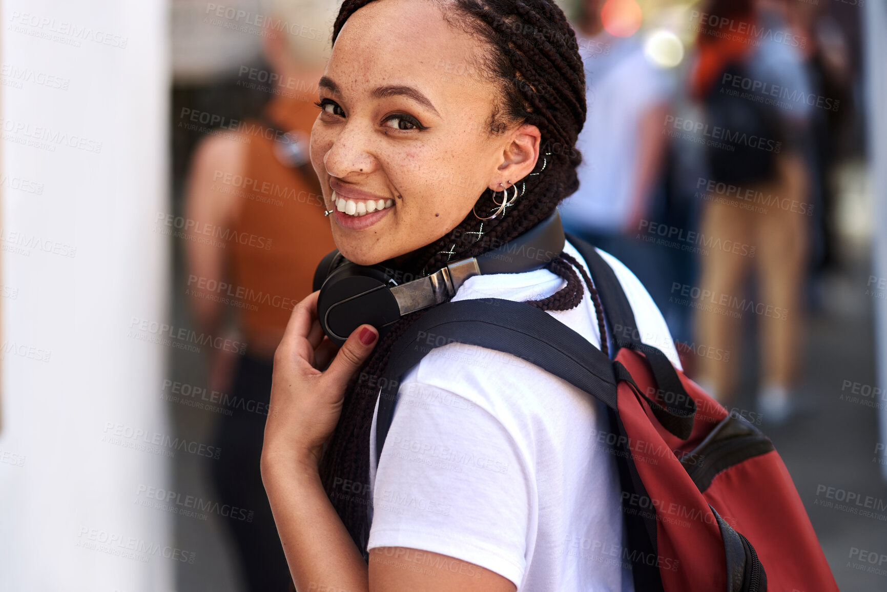 Buy stock photo African woman, student and portrait in street with smile, backpack and headphones for music subscription. Girl, person and happy on metro sidewalk with bag for commute to university on road in city