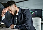 Businessman with depression on the stock market, trading during a financial crisis. Stressed trader in a bear market, looking at stocks crashing. Market crash, stock default and economy failure