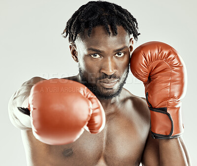 Buy stock photo Portrait, black man and boxing with punch in studio for competition, strength challenge or self defense training on white background. Sports, power and athlete for muscle, champion or cardio workout