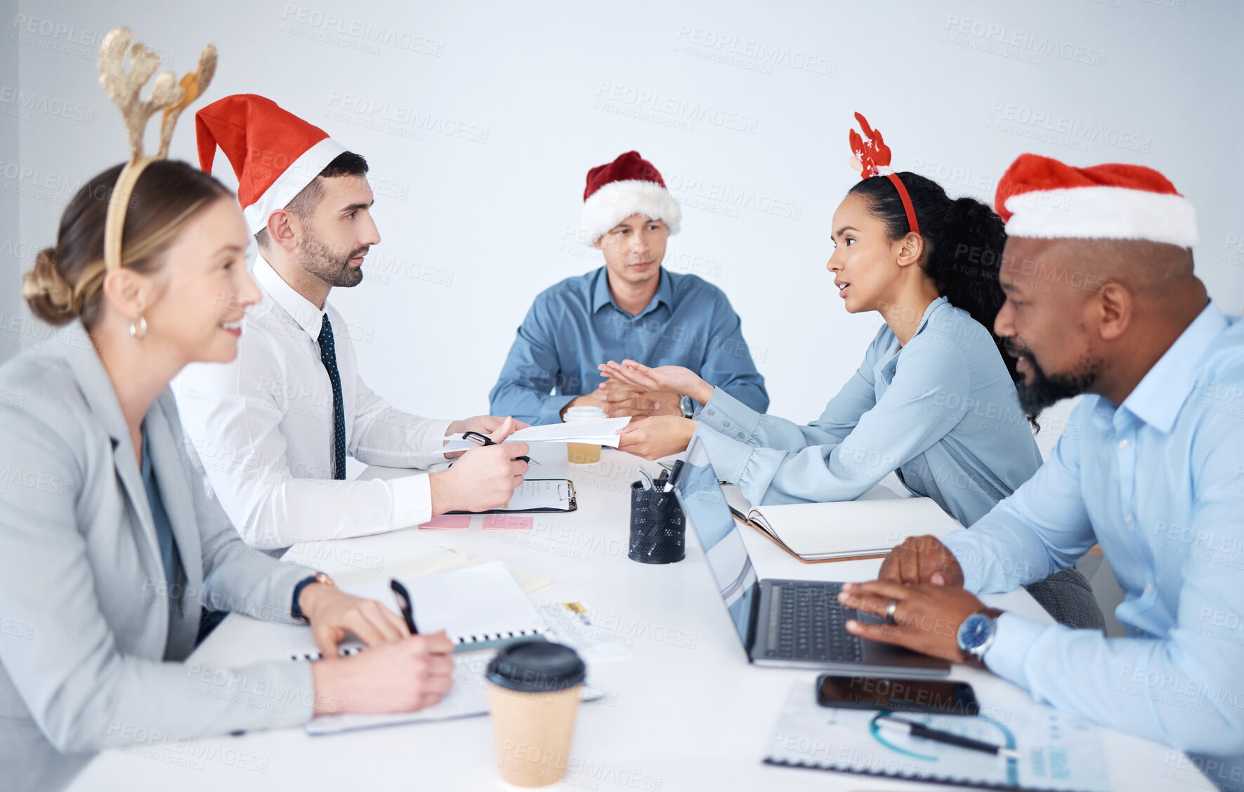 Buy stock photo Business, people and happy in office with Christmas hats for teamwork, collaboration and discussion for project. Employees, boardroom and conversation with feedback on marketing strategy for campaign