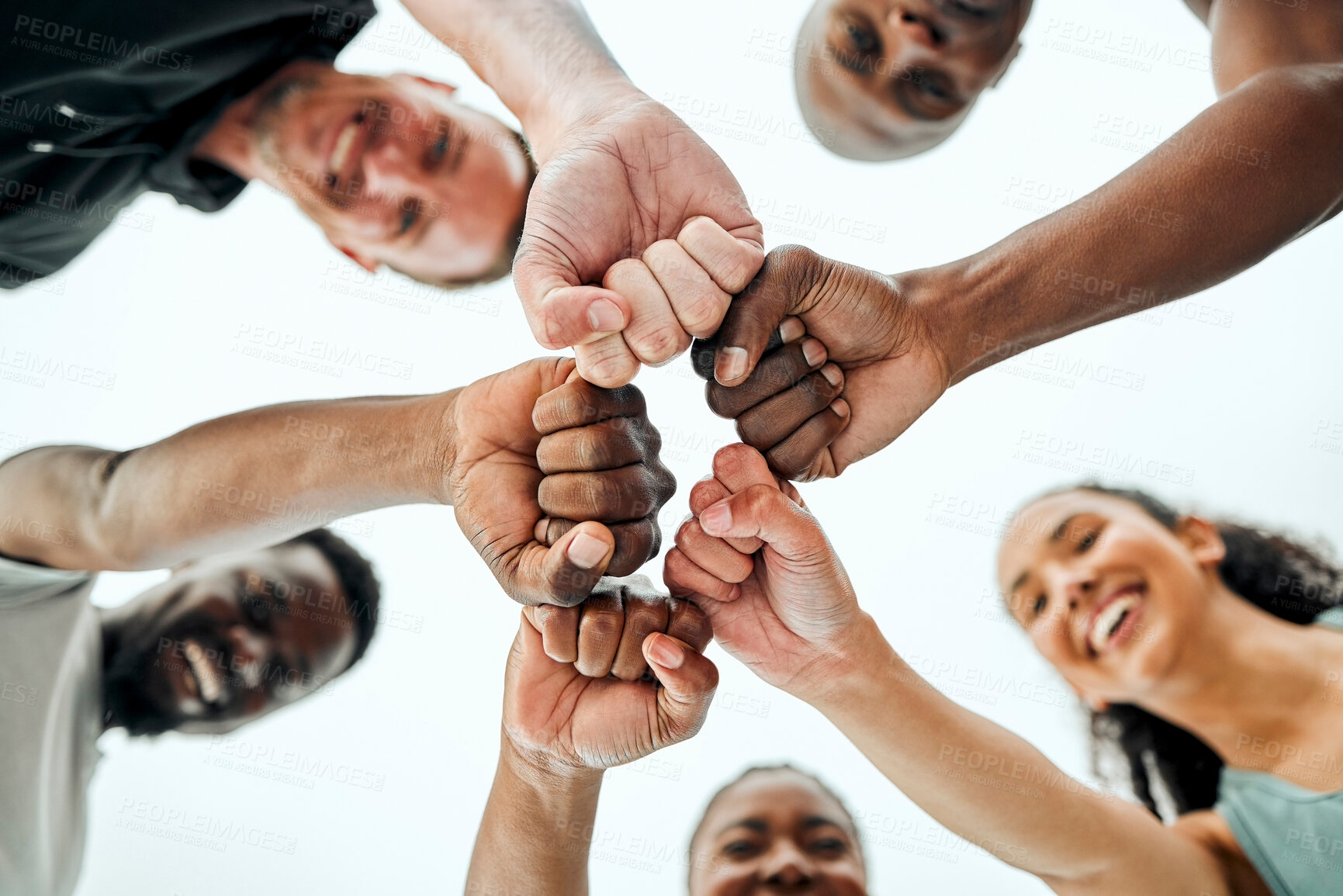 Buy stock photo Sky, fist bump and hands of people with fitness for teamwork, support or running motivation. Low angle, diversity and group of friends with smile for synergy, community or race in morning in nature