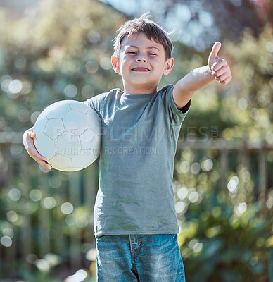 Buy stock photo Boy, child and soccer ball with thumbs up in portrait, choice and backyard in summer at park. Kid, outdoor and football for games, icon and emoji for agreement in sunshine with smile in Buenos Aires