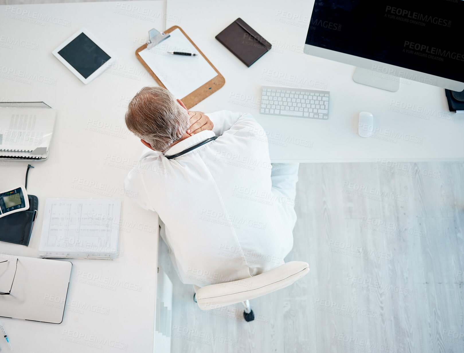 Buy stock photo Healthcare, stress and above of doctor in office with guilt, regret and neck pain at table. Man surgeon, burnout and anxiety at desk for patient care, mistake and error in procedure or negligence