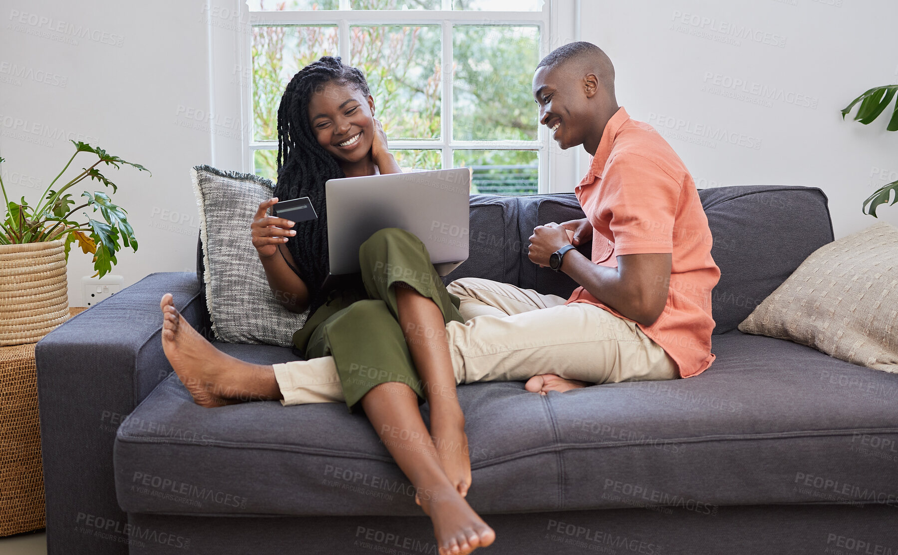 Buy stock photo Black couple, happy and credit card on sofa with laptop for ecommerce, web store and furniture sale. African woman, man and computer with payment for online shopping, subscription and bills in home