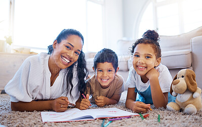 Buy stock photo Drawing, relax and portrait of mother with children on floor in living room for creative learning. Smile, bonding and mom teach kids with crayons and color book for motor skills development at home