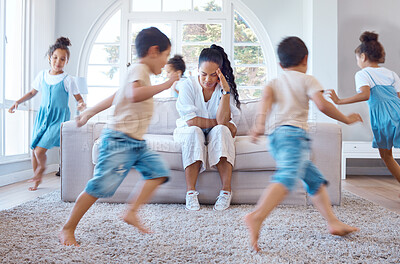 Buy stock photo Frustrated mother, children and depression with chaos, hyperactive or adhd kids in living room at home. Tired mom with headache in stress, anxiety or noise for energetic siblings running at house